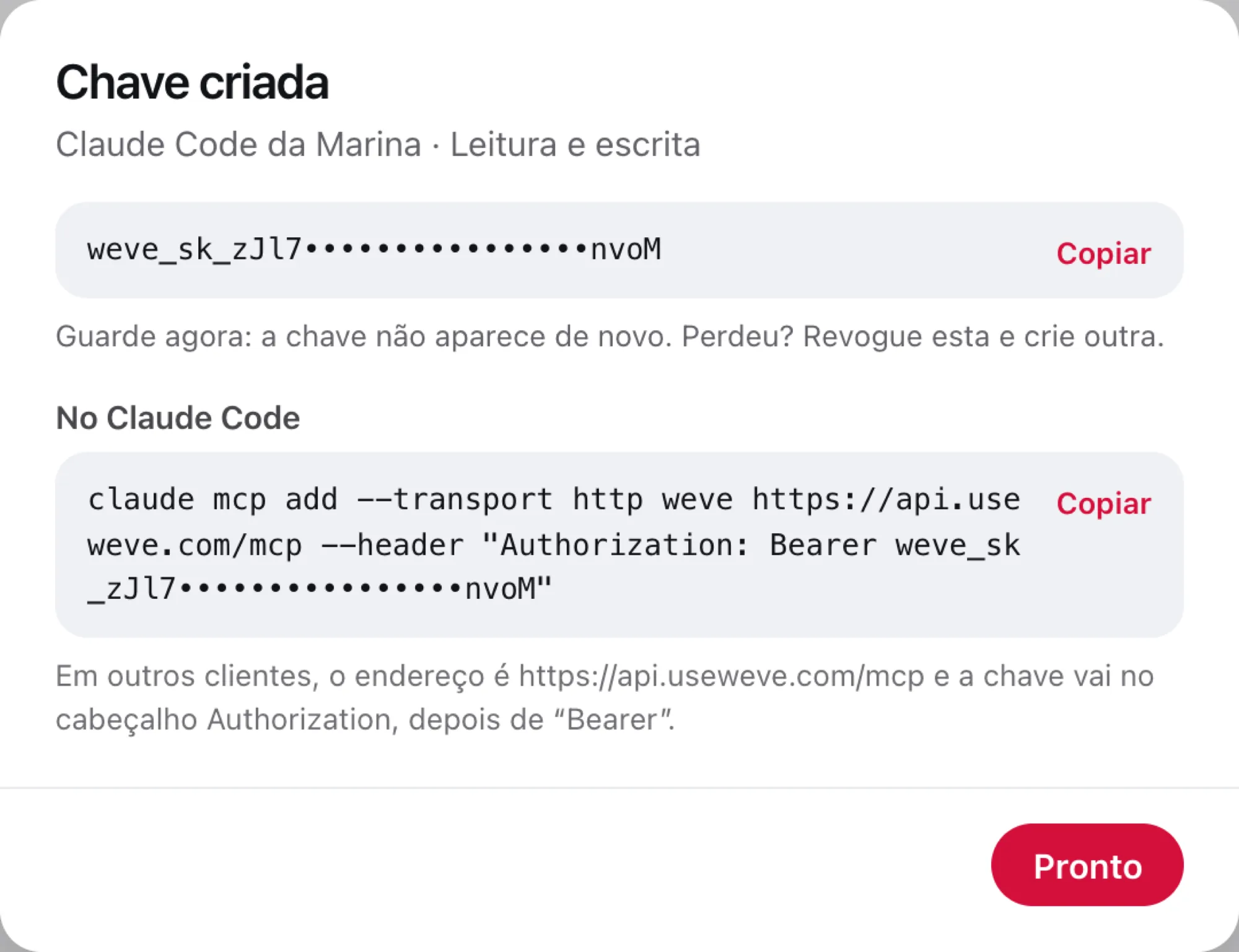 Chave criada, com a chave (parcialmente oculta) e o comando pronto para o Claude Code