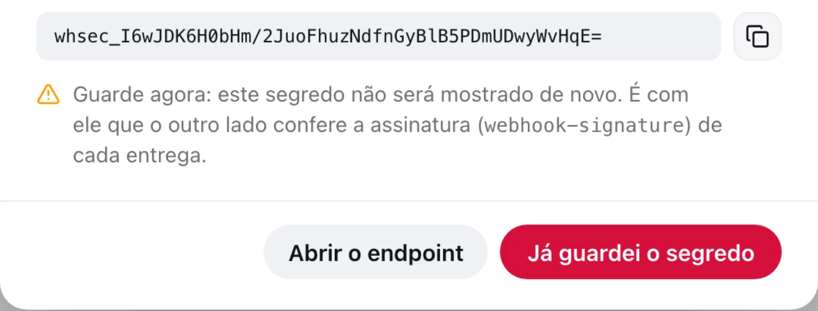 O segredo de assinatura com o botão de copiar, o aviso de que ele não será mostrado de novo e o botão Já guardei o segredo